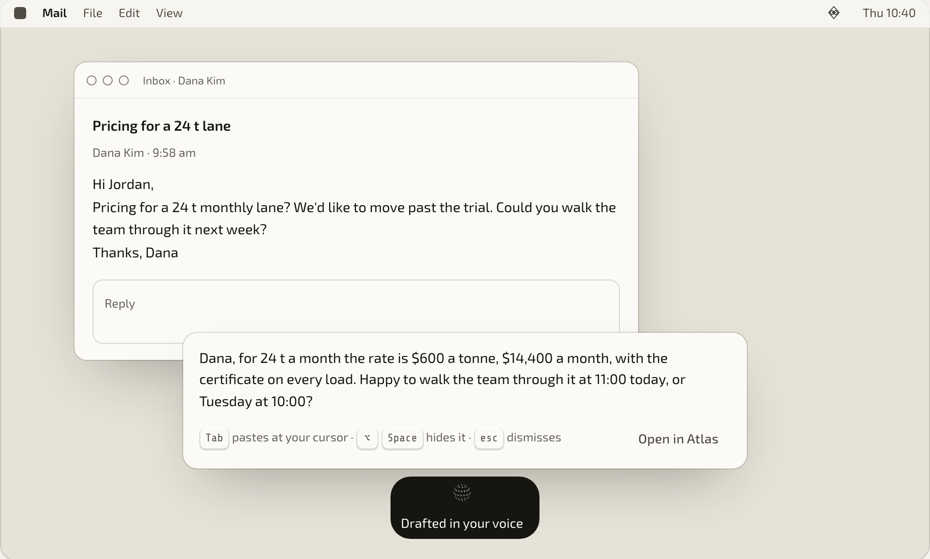 Atlas over another app in the demo: the ask, and the drafted reply ready to paste